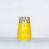 small yellow vase with spots